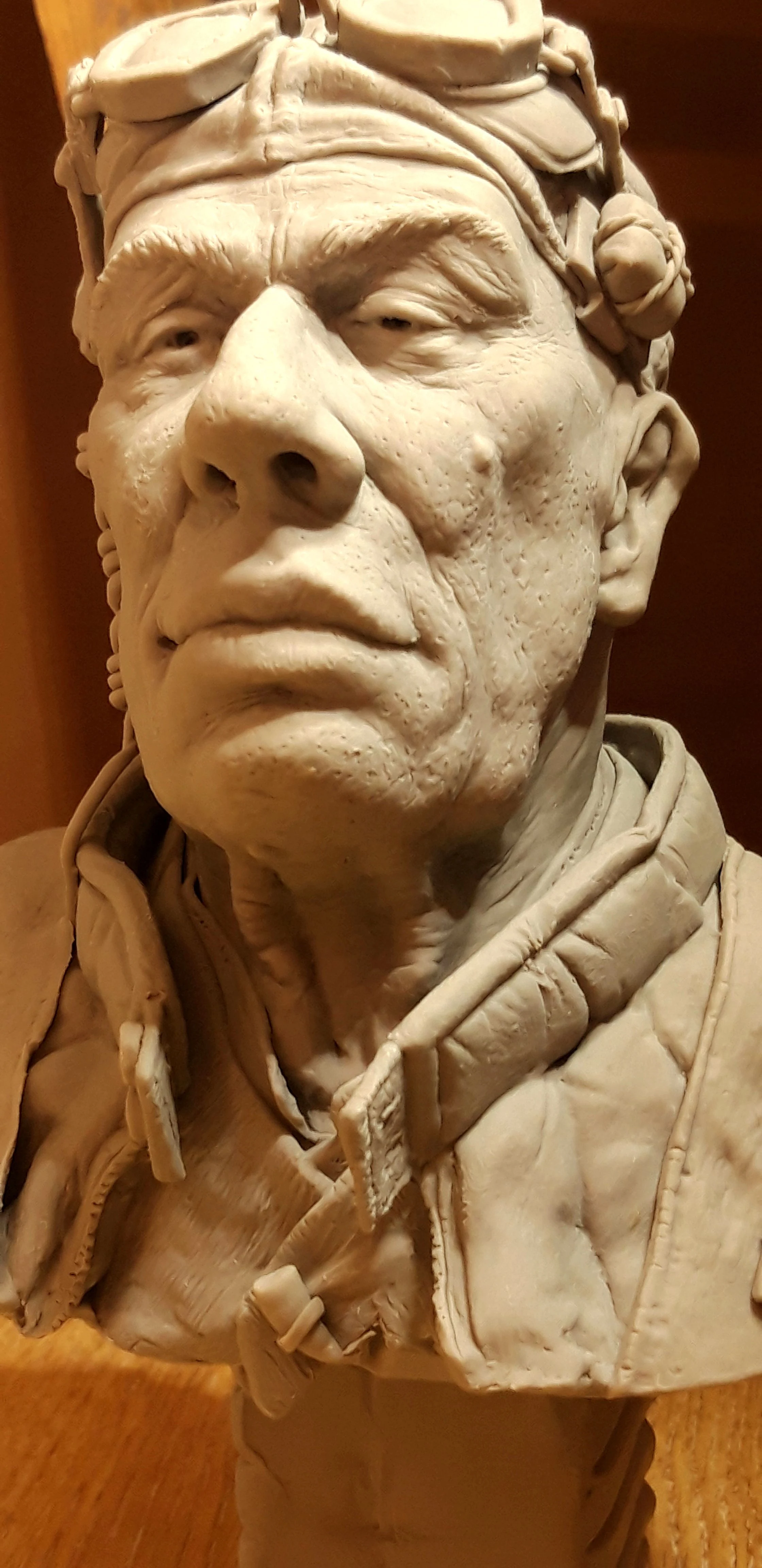 man with goggles by sculptor